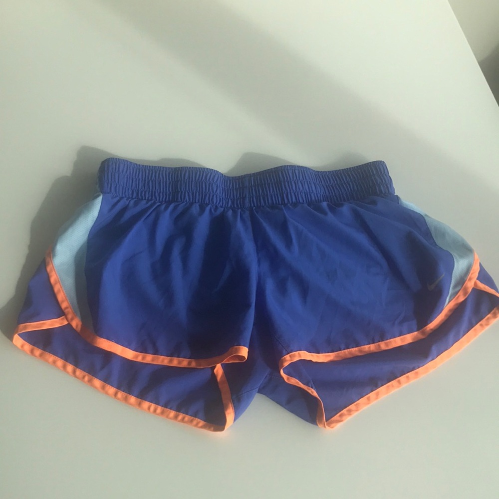 Nike blue and neon orange running shorts